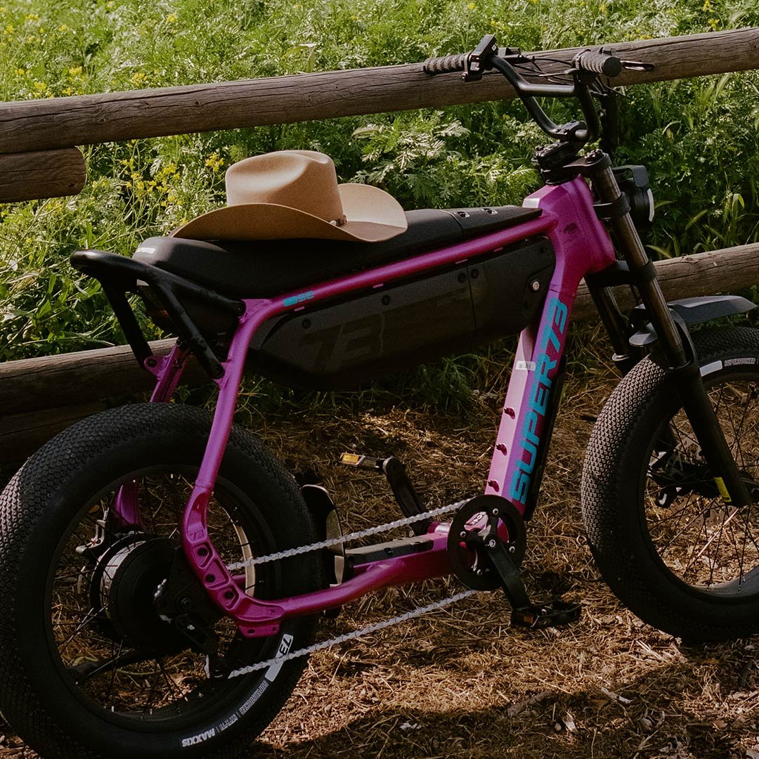 Bike against a wooden fence