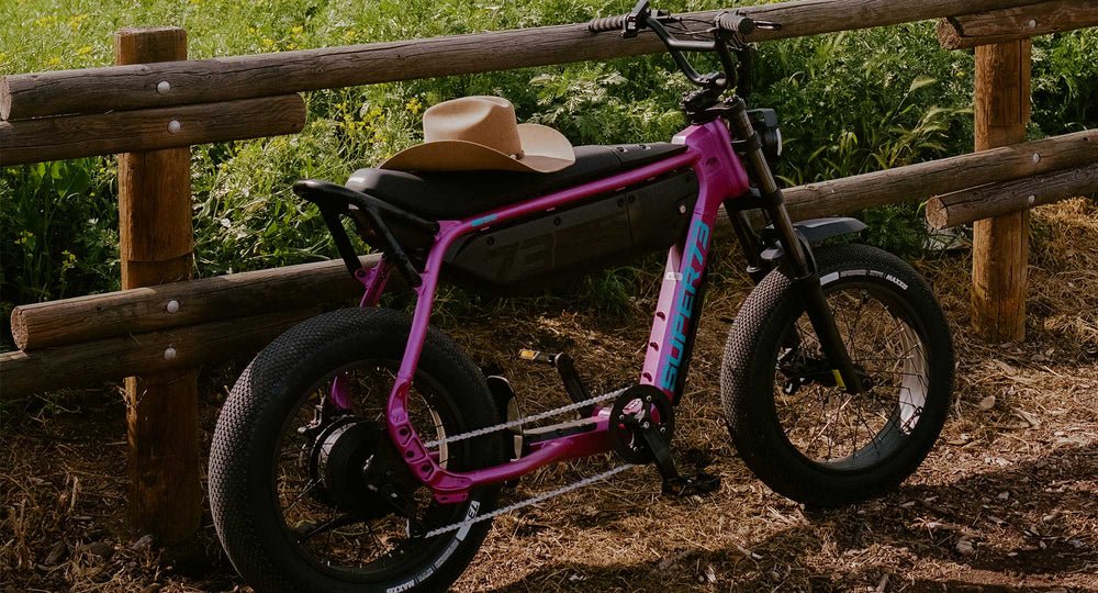 A-Series bike against a wooden fence