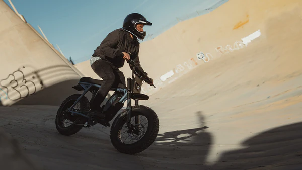 Rider in a skatepark bowl on an S-Series bike